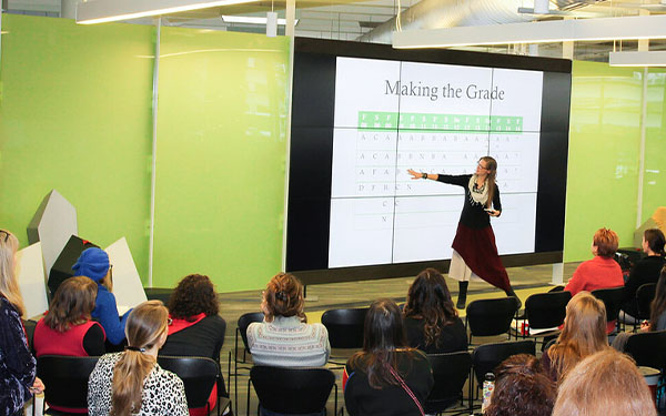 a librarian giving a presentation at the Auraria Library