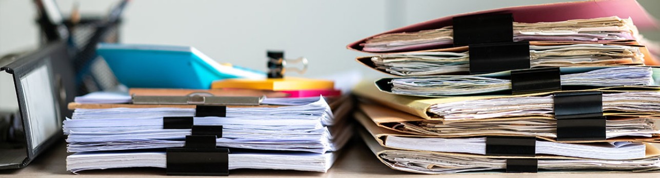 stacks of files and papers ready to be organized