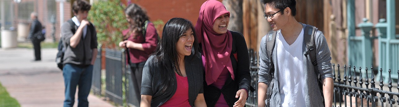 Laughing Students walking on Campus