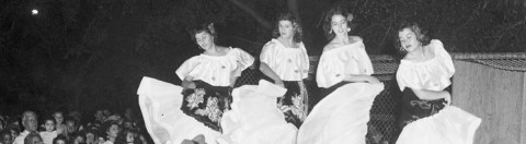 Image Source: Auraria Library women dancing at a community celebration