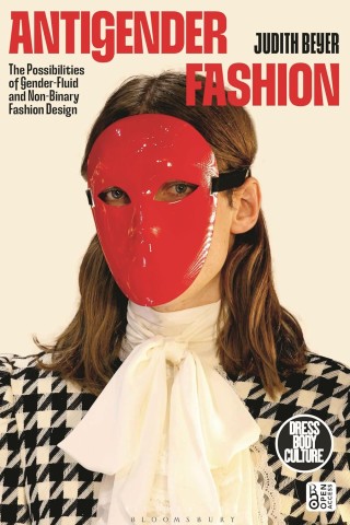 Person wearing a red mask, houndstooth jacket, and white bow shirt on book cover titled "Antigender Fashion." Bold text and modern style.