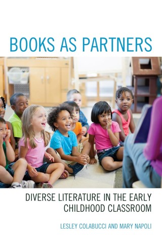 A diverse group of young children sits on the floor, eagerly looking at something off-camera. The text reads, "Books as Partners: Diverse Literature in the Early Childhood Classroom" by Lesley Colabucci and Mary Napoli.