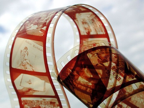 Film Strip (c) Bart CC By 2.0 Film strip showing images including a couple embracing.