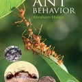 Cover of "Ant Behavior" by Abraham Hefetz. It features a chain of ants on a leaf with three circular insets showing close-ups of ants and their habitat.