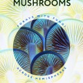 Cover of "Meetings with Remarkable Mushrooms" by Alison Pouliot, featuring vibrant, close-up images of mushroom gills in blue and yellow tones.