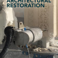Robotic machinery carves intricate patterns into stone for architectural restoration. The image conveys innovation and precision. Title text: "Robotics for Architectural Restoration" by Sara Codarin.